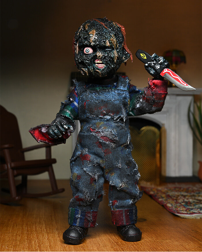 NECA-Charred-Chucky.jpg.8f66d910d25a04e6d93493cf2ed418d0.jpg